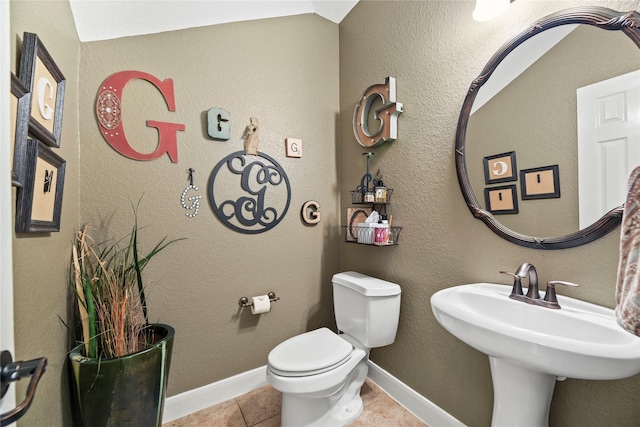 12415 Bunker Cove Dr, Cypress, TX 77433 - bathroom with toilet, tile patterned flooring, and a sink
