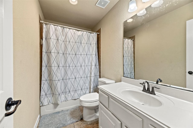 12415 Bunker Cove Dr, Cypress, TX 77433 - full bath featuring vanity, toilet, a textured wall, tile patterned flooring, and shower / bath combination with curtain