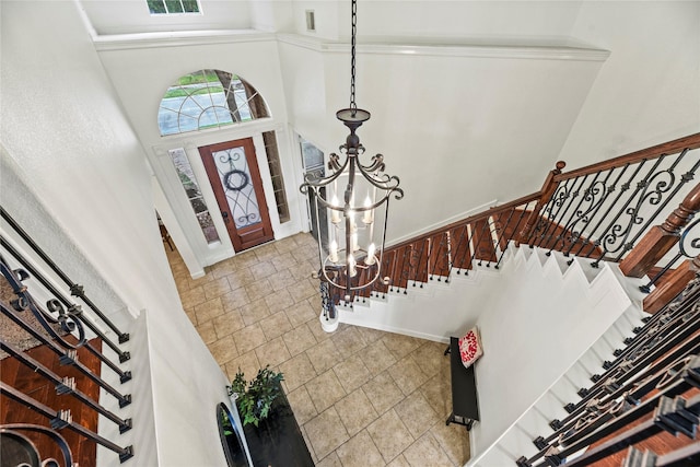 12415 Bunker Cove Dr, Cypress, TX 77433 - entrance foyer with stairway, a chandelier, and a towering ceiling