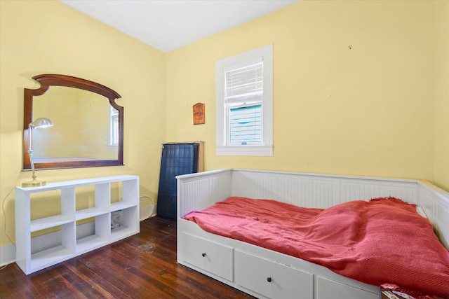 1714 Market St, Galveston, TX 77550 - bedroom featuring dark wood-style floors and wainscoting