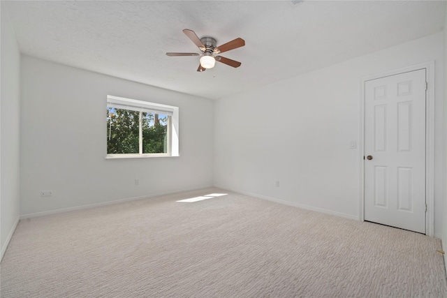 20611 Shillington Ct, Katy, TX 77450 - spare room featuring ceiling fan, carpet floors, and baseboards