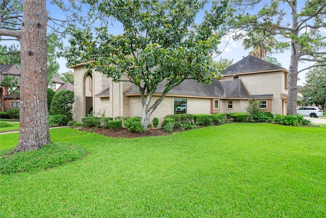 20611 Shillington Ct, Katy, TX 77450 - view of front of house featuring a front lawn, roof with shingles, and brick siding