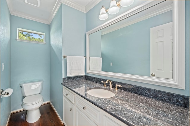 20611 Shillington Ct, Katy, TX 77450 - half bathroom featuring toilet, wood finished floors, vanity, ornamental molding, and baseboards