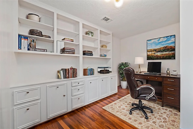 20611 Shillington Ct, Katy, TX 77450 - office area with dark wood-style floors and a textured ceiling