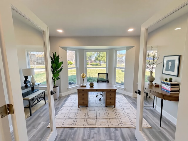9219 Pecos St, Houston, TX 77055 - office with french doors, wood finished floors, baseboards, and recessed lighting