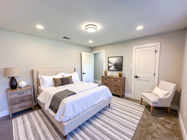 9219 Pecos St, Houston, TX 77055 - bedroom with light carpet, baseboards, and recessed lighting