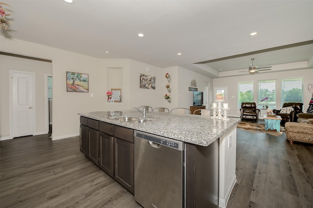 5766 Cerrillos Dr, Bryan, TX 77807 - kitchen with dishwasher, open floor plan, dark wood-style flooring, a sink, and recessed lighting