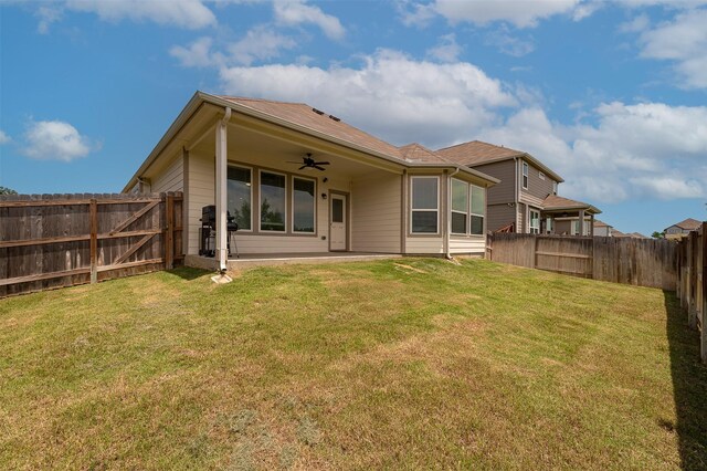 5766 Cerrillos Dr, Bryan, TX 77807 - rear view of house with a ceiling fan and a patio area