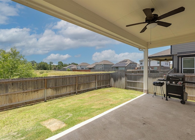 5766 Cerrillos Dr, Bryan, TX 77807 - view of yard with a ceiling fan, a patio, and a residential view