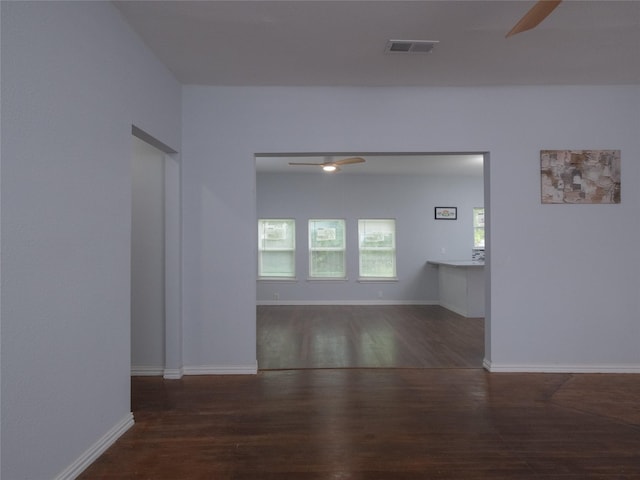 2703 Areba St, Houston, TX 77091 - unfurnished room with ceiling fan, wood finished floors, and baseboards