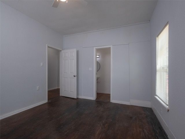 2703 Areba St, Houston, TX 77091 - unfurnished bedroom featuring wood finished floors, a ceiling fan, and baseboards