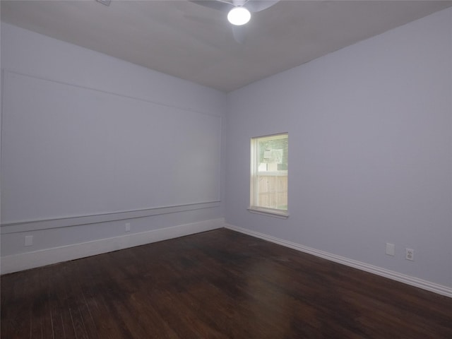 2703 Areba St, Houston, TX 77091 - empty room with ceiling fan, dark wood-style floors, and baseboards