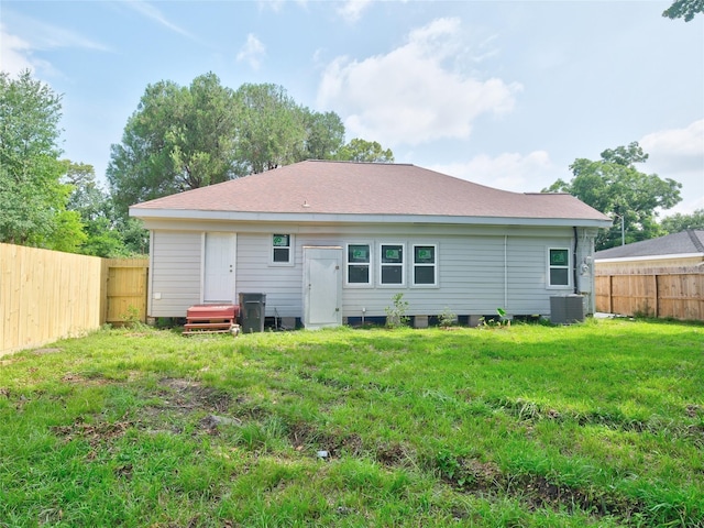2703 Areba St, Houston, TX 77091 - rear view of house featuring central AC