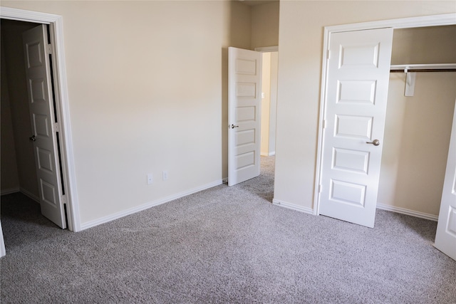 40575 Goldeneye Pl, Magnolia, TX 77354 - unfurnished bedroom with carpet flooring, baseboards, and a closet