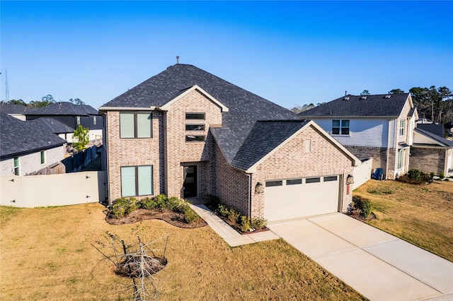 40575 Goldeneye Pl, Magnolia, TX 77354 - traditional-style house featuring brick siding, an attached garage, driveway, and roof with shingles