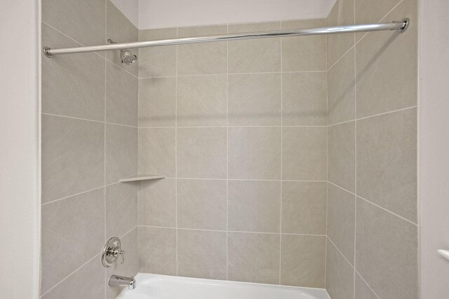 1963 Waters Branch Dr, Missouri City, TX 77459 - bathroom featuring washtub / shower combination