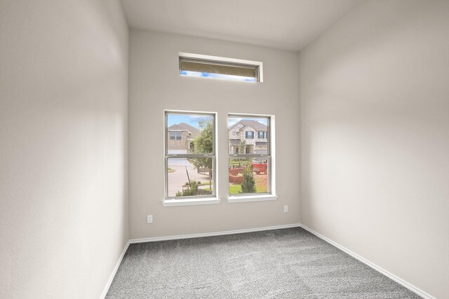 1963 Waters Branch Dr, Missouri City, TX 77459 - spare room featuring carpet floors and baseboards