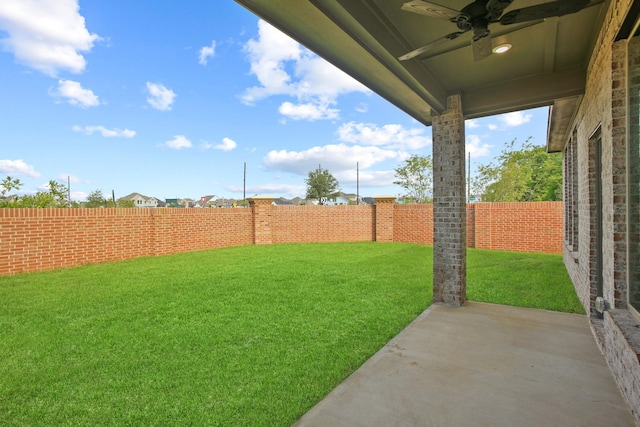1963 Waters Branch Dr, Missouri City, TX 77459 - view of yard featuring ceiling fan and a patio