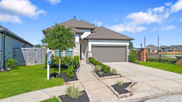 1963 Waters Branch Dr, Missouri City, TX 77459 - view of front facade featuring a garage, driveway, stucco siding, roof with shingles, and a residential view