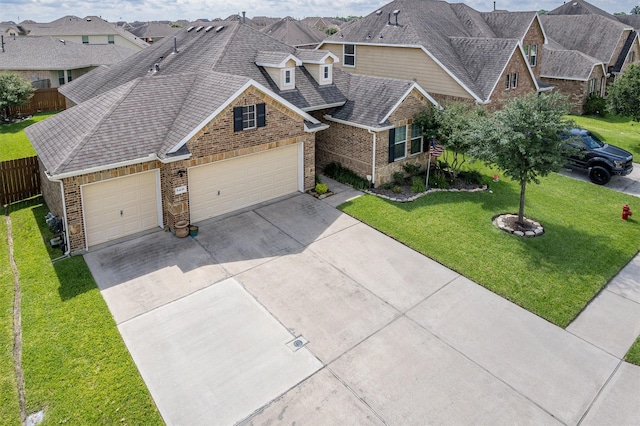 8406 Quiet Bay Dr, Baytown, TX 77523 - view of front of property featuring concrete driveway, an attached garage, brick siding, a residential view, and a shingled roof