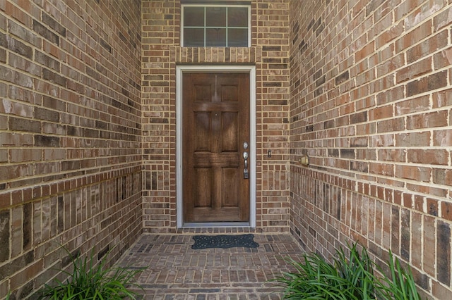 8406 Quiet Bay Dr, Baytown, TX 77523 - view of exterior entry featuring brick siding