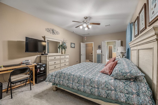 8406 Quiet Bay Dr, Baytown, TX 77523 - carpeted bedroom with an office area, a ceiling fan, and connected bathroom