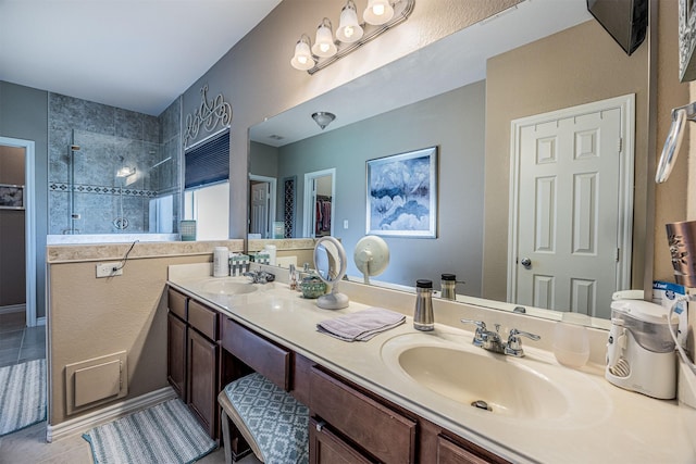 8406 Quiet Bay Dr, Baytown, TX 77523 - bathroom featuring a walk in shower, double vanity, and tile patterned floors