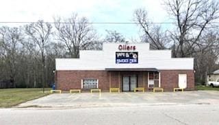 9085 Main St, Batson, TX 77519 - view of building exterior featuring uncovered parking
