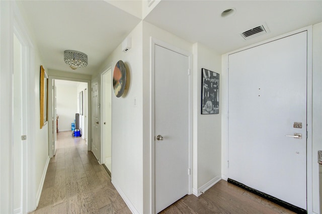 5001 Woodway Dr Unit 1405, Houston, TX 77056 - corridor with light wood finished floors and baseboards