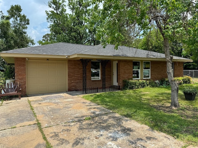8117 Snowden St, Houston, TX 77028 - single story home featuring a garage, concrete driveway, and brick siding