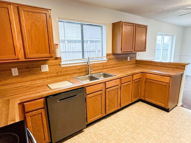 7331 Burkridge Dr, Houston, TX 77041 - kitchen featuring a sink, dishwasher, a peninsula, and brown cabinets