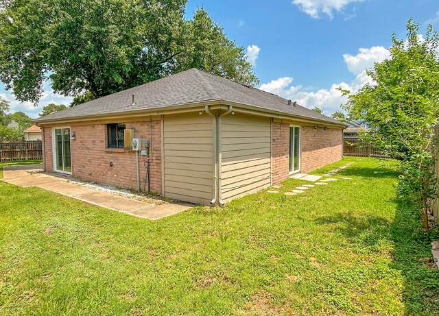 7331 Burkridge Dr, Houston, TX 77041 - view of home's exterior featuring brick siding and a shingled roof