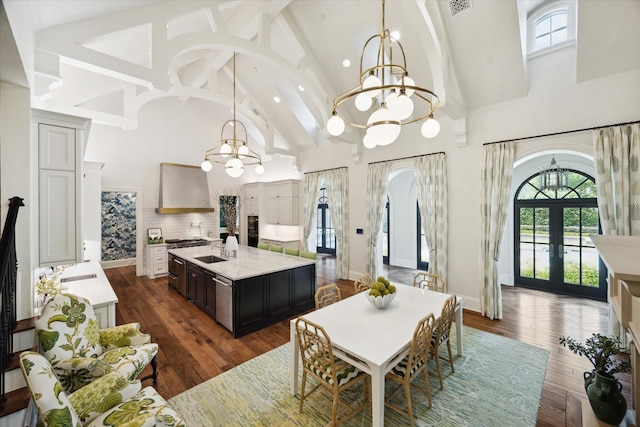 24 Farnham Park Dr, Houston, TX 77024 - dining room with a chandelier, high vaulted ceiling, french doors, beam ceiling, and dark wood finished floors