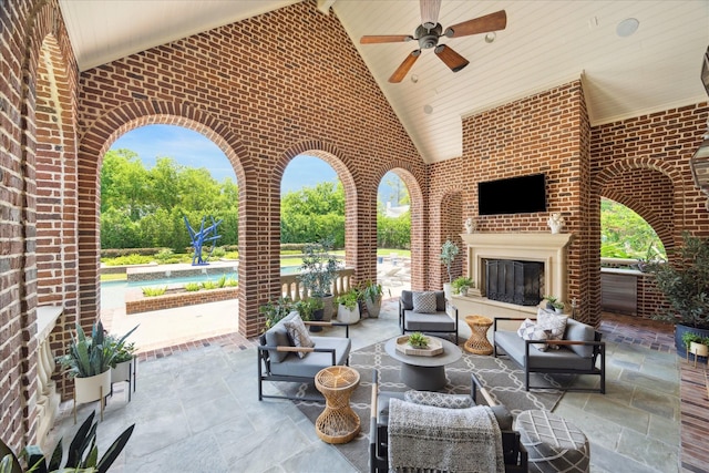 24 Farnham Park Dr, Houston, TX 77024 - view of patio / terrace featuring ceiling fan, a swimming pool, and an outdoor living space with a fireplace