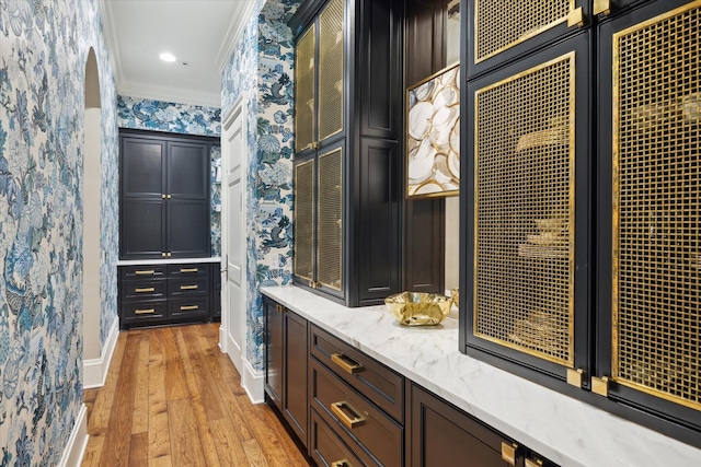 24 Farnham Park Dr, Houston, TX 77024 - bar with ornamental molding, light wood-style floors, baseboards, and wallpapered walls
