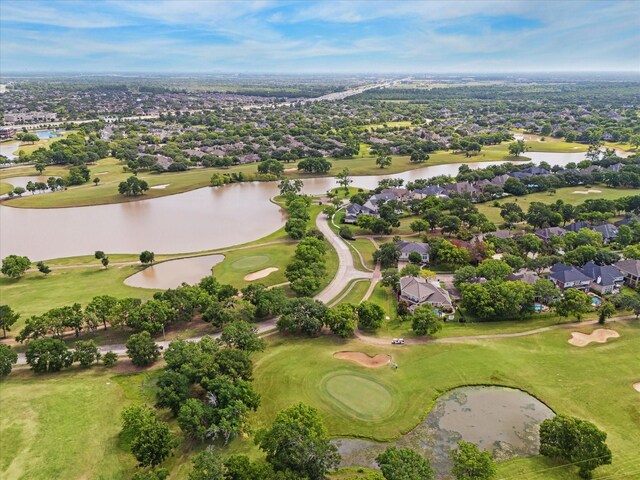 7215 Timberlake Dr, Sugar Land, TX 77479 - aerial overview of property's location with nearby suburban area, a large body of water, and a golf club