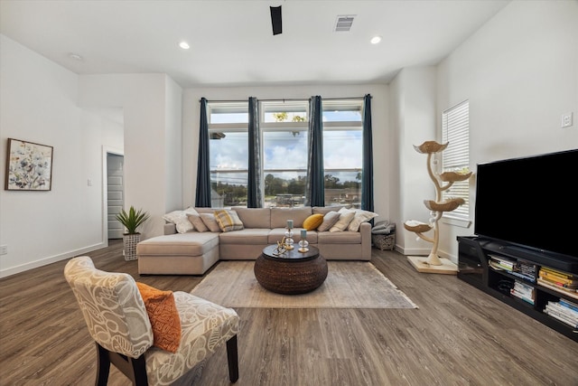306 W Donovan St, Houston, TX 77091 - living room with baseboards, wood finished floors, and recessed lighting