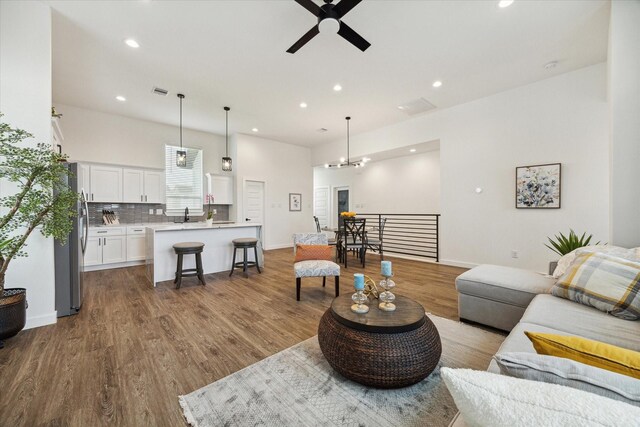 306 W Donovan St, Houston, TX 77091 - living area with a ceiling fan, wood finished floors, and recessed lighting