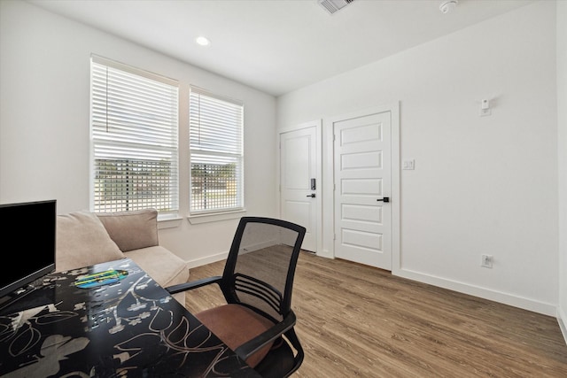 306 W Donovan St, Houston, TX 77091 - office space with baseboards and wood finished floors