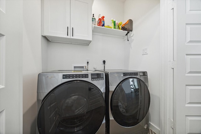 306 W Donovan St, Houston, TX 77091 - laundry area featuring cabinet space and washing machine and clothes dryer