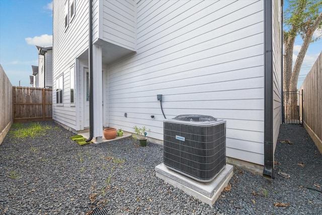 306 W Donovan St, Houston, TX 77091 - exterior view of central AC unit and a fenced backyard