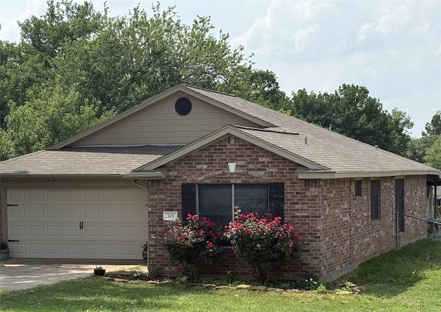 207 Leisure Ln, Montgomery, TX 77356 - ranch-style home featuring a shingled roof, brick siding, driveway, and a garage