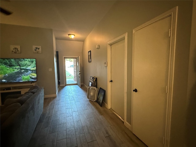 207 Leisure Ln, Montgomery, TX 77356 - hallway with dark wood finished floors and baseboards