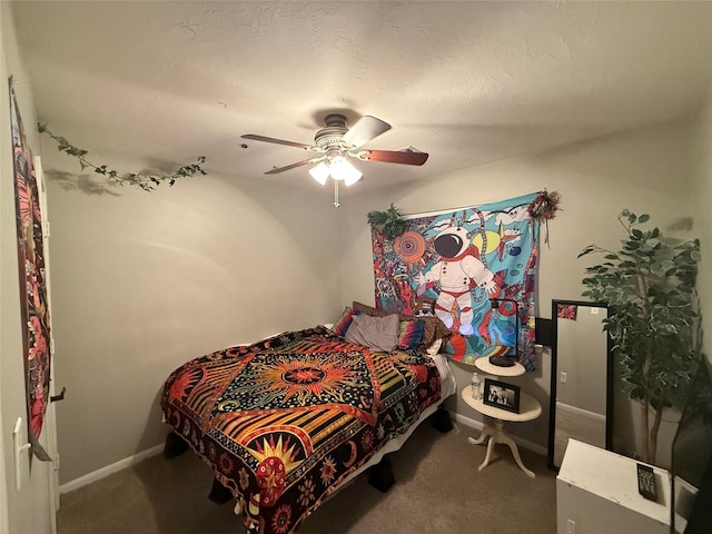 207 Leisure Ln, Montgomery, TX 77356 - carpeted bedroom with baseboards and ceiling fan