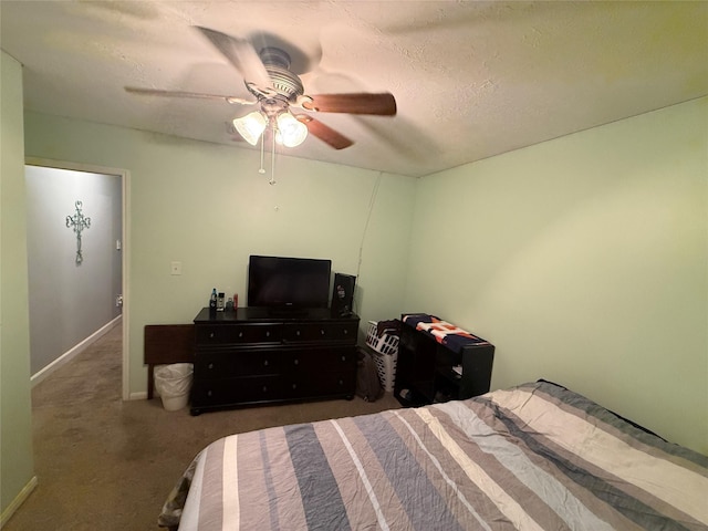 207 Leisure Ln, Montgomery, TX 77356 - carpeted bedroom with ceiling fan and baseboards