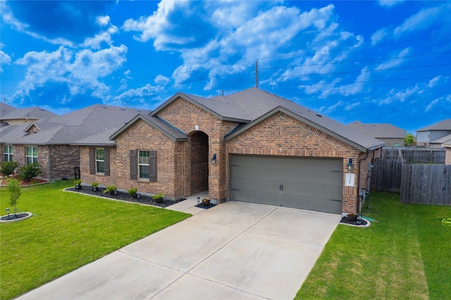 1318 Bellingham Park Dr, Missouri City, TX 77459 - view of front of home with brick siding, driveway, a garage, and a shingled roof