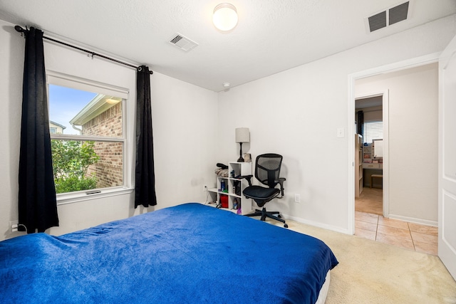 5327 Castle Discordia St, Katy, TX 77493 - carpeted bedroom with tile patterned floors and baseboards