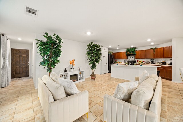 5327 Castle Discordia St, Katy, TX 77493 - living area with recessed lighting and light tile patterned floors