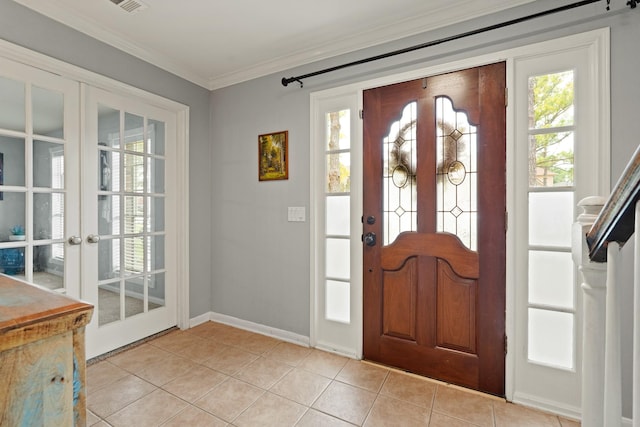 10503 Minturn Ln, Houston, TX 77064 - entryway with french doors, crown molding, healthy amount of natural light, and light tile patterned floors