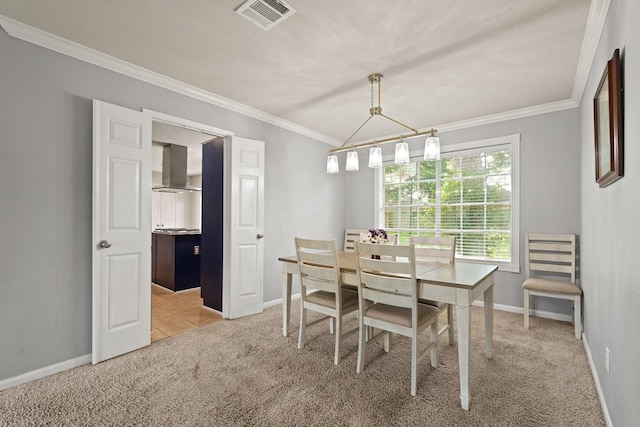 10503 Minturn Ln, Houston, TX 77064 - dining room with light carpet, crown molding, and baseboards